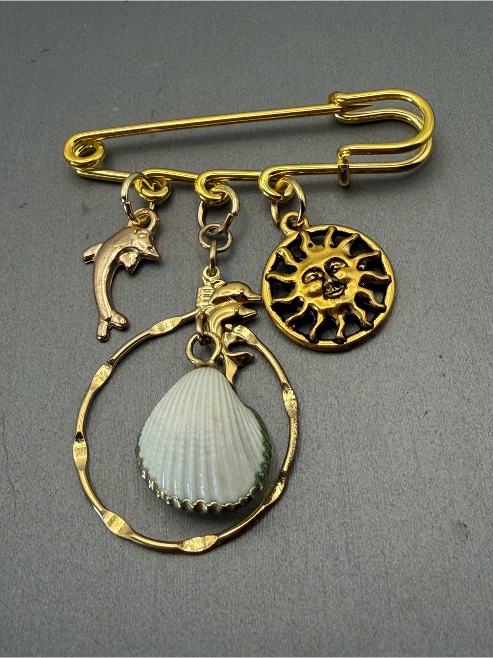 Coastal Smiling Sun, Dolphin & Shell Charm Safety Pin Brooch Gold Tone
